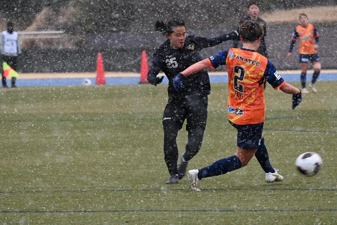 With her trusty brolly, Danelle Tan embraces challenges as a pro footballer in Japan